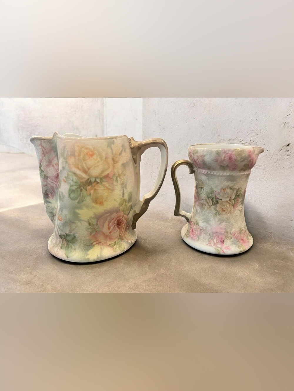 Two antique 1900s Royal Bayreuth porcelain pitchers with Rose Tapestry pattern.